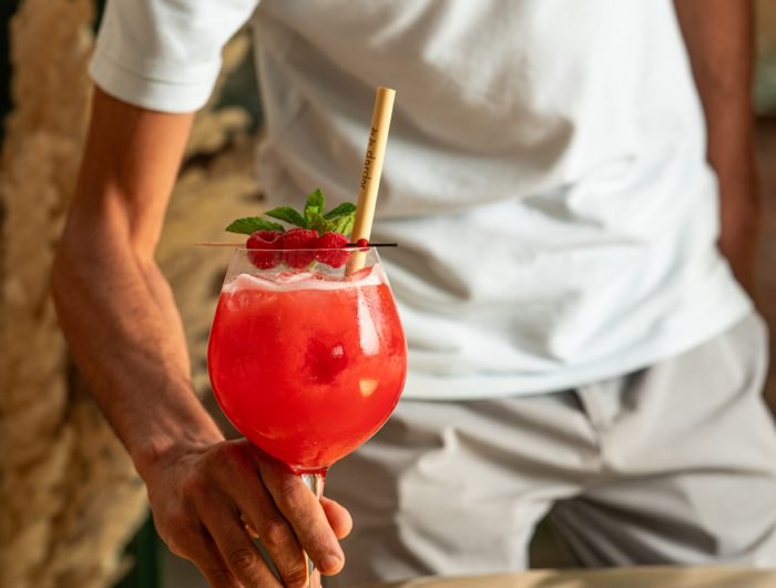 Rooftop bar Marrakech with panoramic views of Atlas Mountains and Koutoubia Mosque at sunset